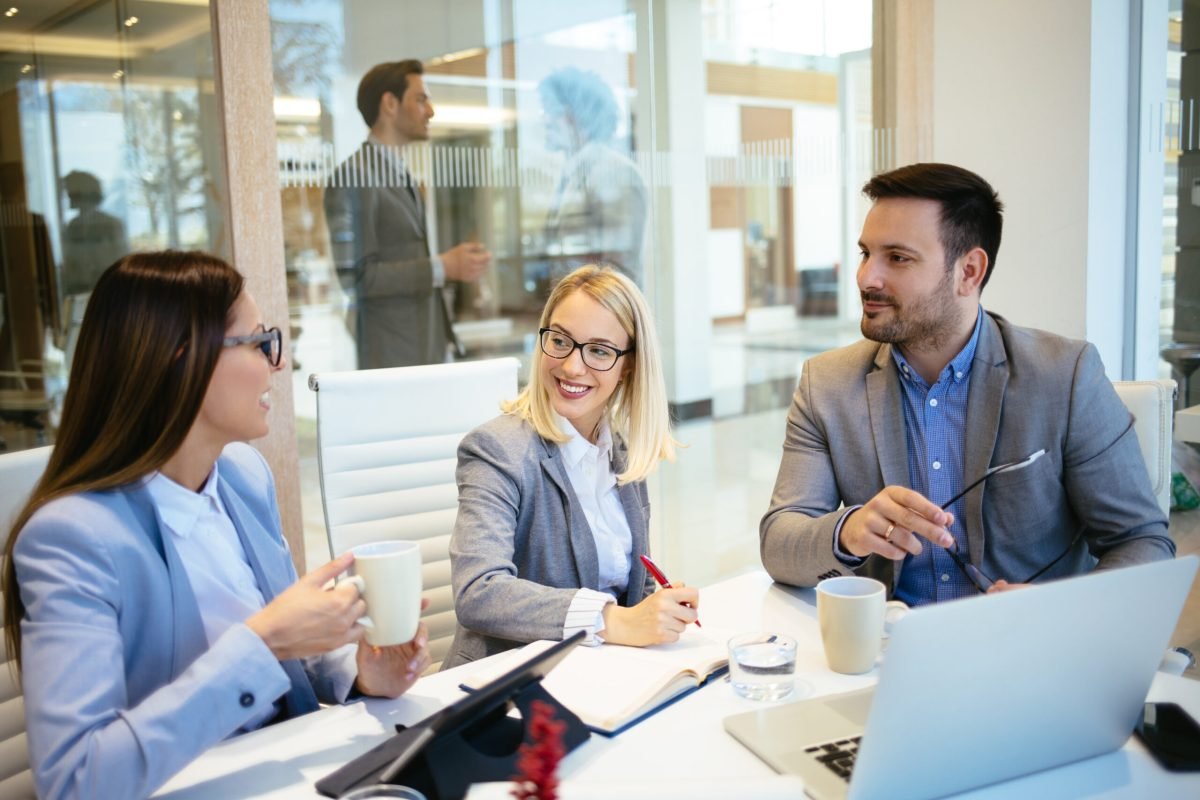 Business team brainstorming and discussing project in meeting room